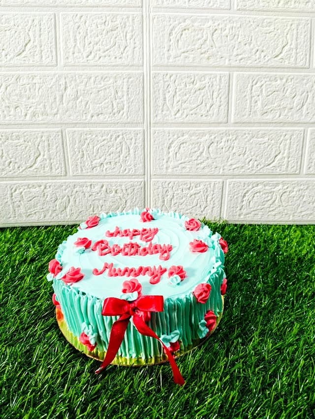 Blue Red Bow Flower Birthday Cake — birthday cake in Goa by Sweet Bites