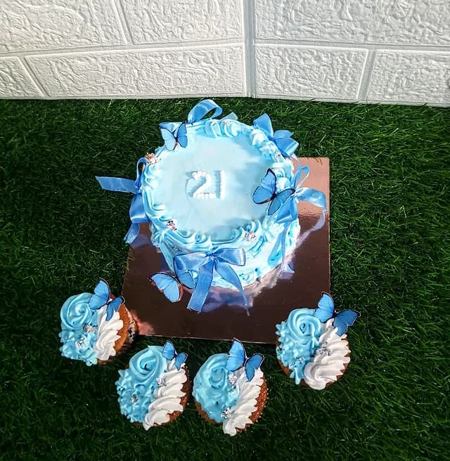 Blue Bow Cake — custom cake in Goa by Sweet Bites