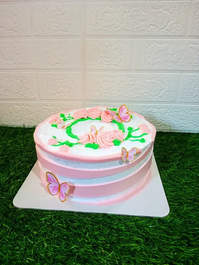 Butterfly Cream Cake — custom cake in Goa by Sweet Bites