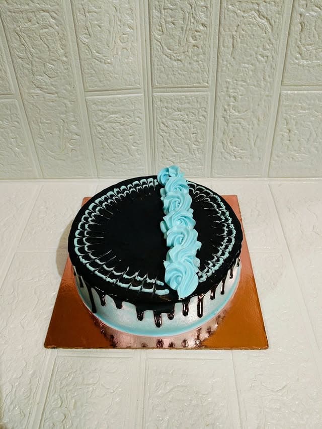 Chocolate Syrup Blue Cream Birthday Cake — birthday cake in Goa by Sweet Bites