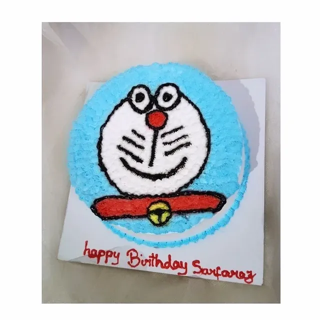 Doraemon Cream Cake — custom cake by Sweet Bites Goa