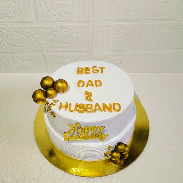 Golden Cream Cake — custom cake by Sweet Bites Goa