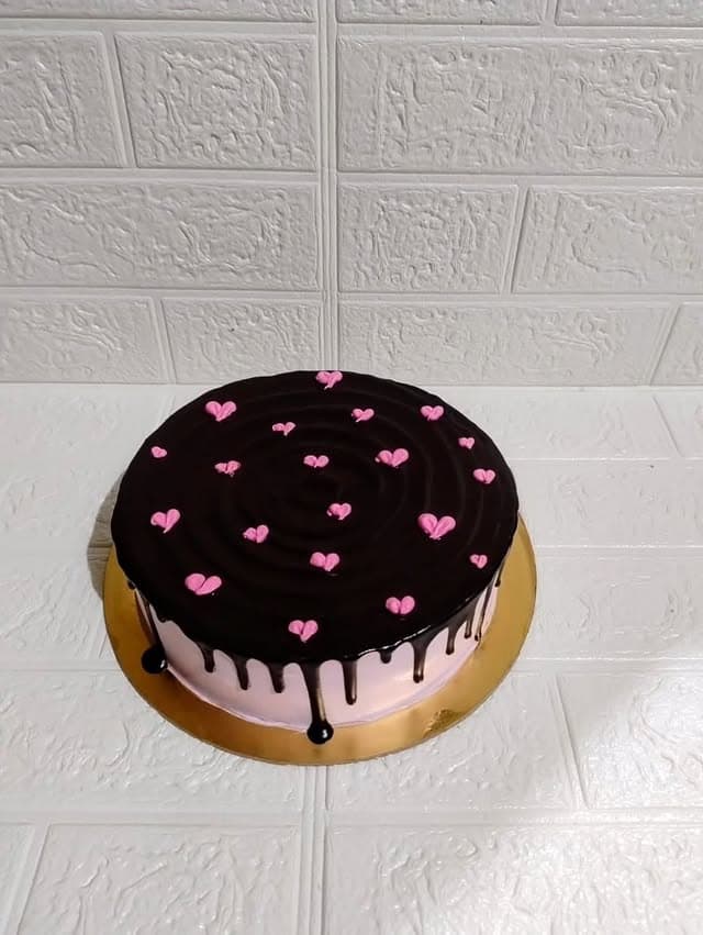 Pink Heart Chocolate Syrup Cake — custom cake in Goa by Sweet Bites