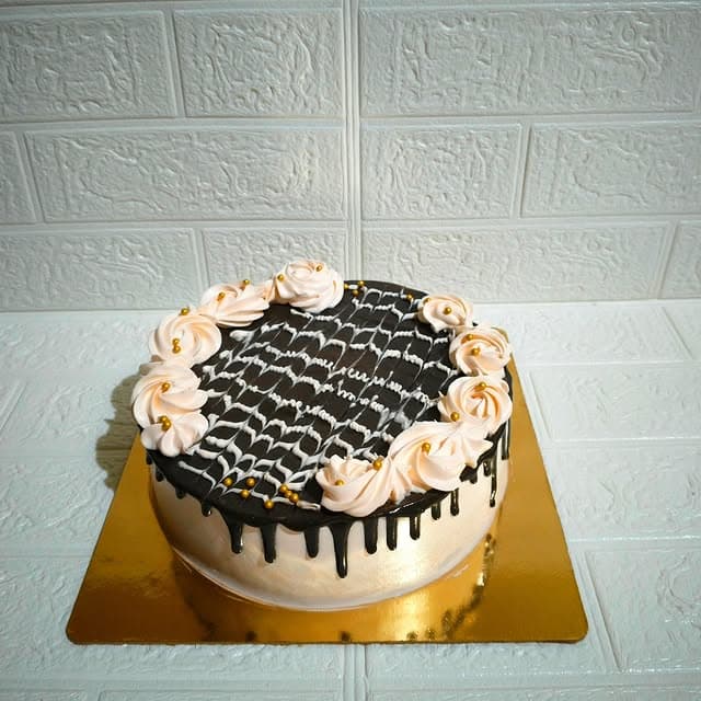 Syrup Cake — custom cake by Sweet Bites Goa