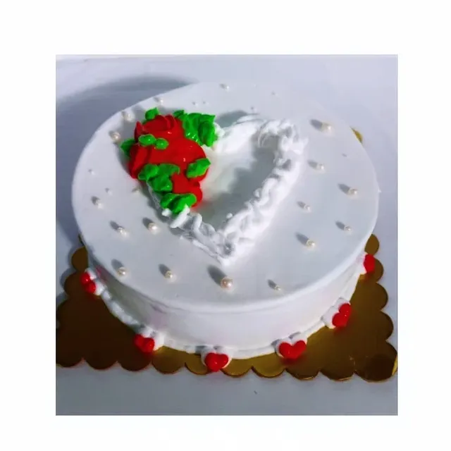 White Cream Heart Cake — custom cake in Goa by Sweet Bites