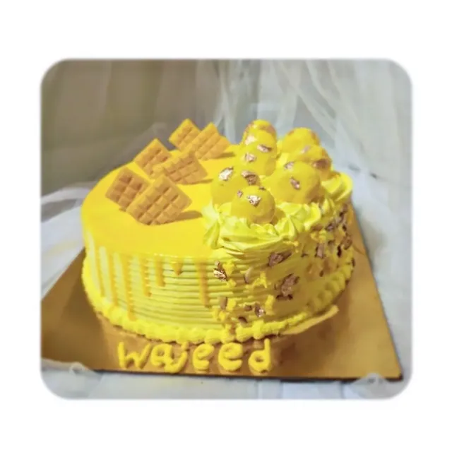 Yellow Chocolate Bar Cake — custom cake in Goa by Sweet Bites