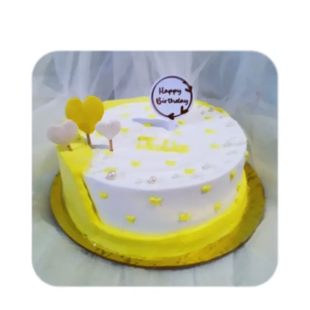 Yellow White Heart Birthday Cake — birthday cake in Goa by Sweet Bites